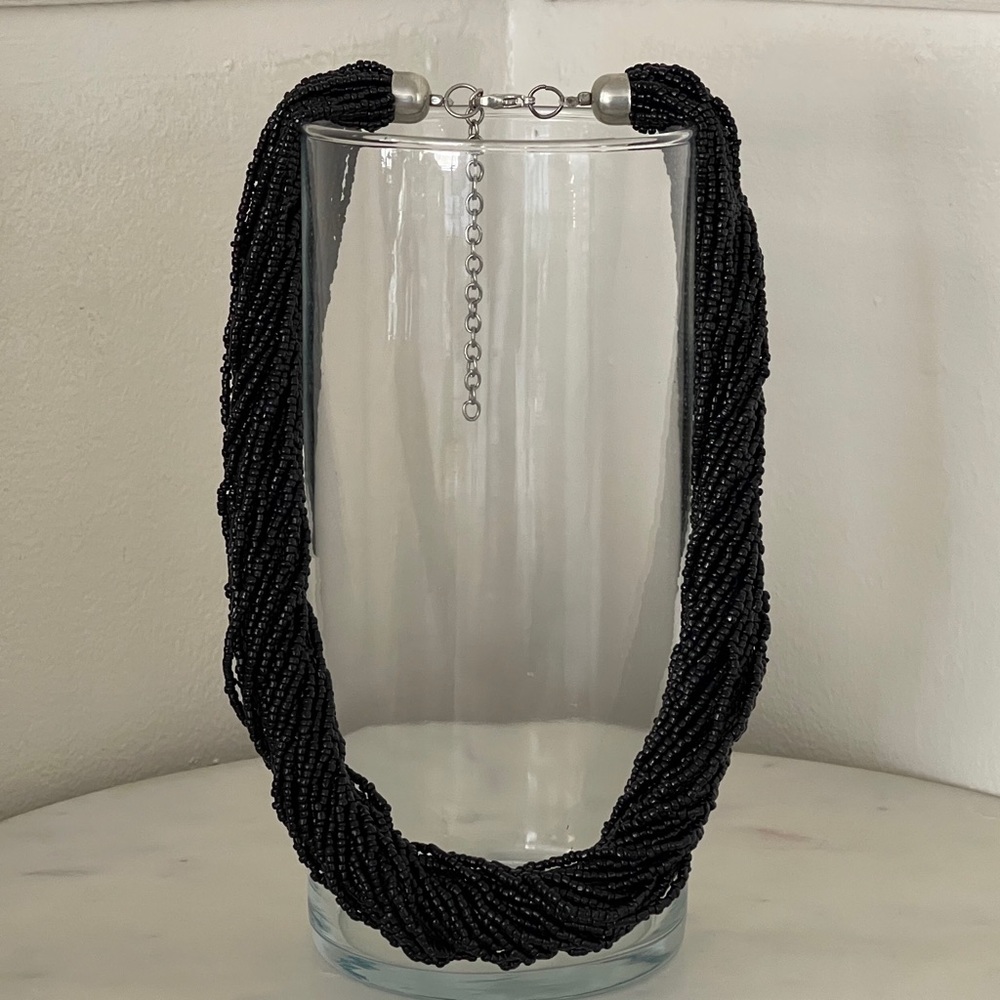 Black multi strands seed beads necklace.